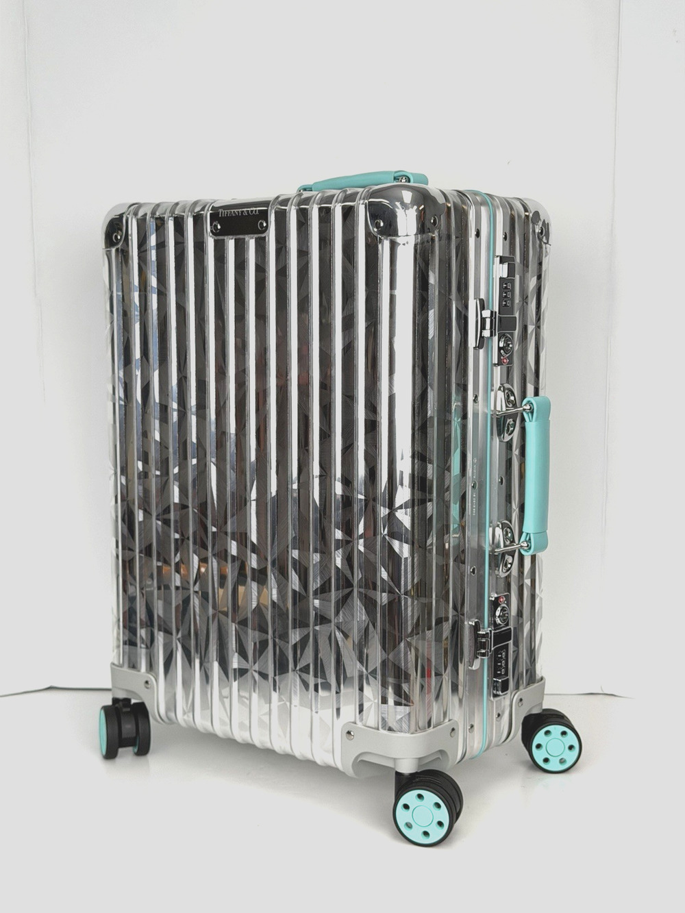 Rimowa x Tiffany & Co. Rock Cut Carry On Rolling Suitcase in Silver-Tone Color
